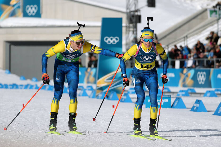 Виталий Мандзин и Елена Городна / Getty Images