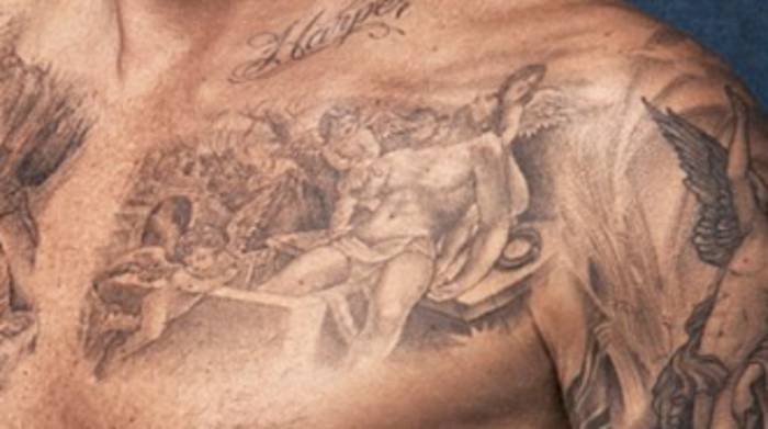 Значение татуировок в виде креста на грудине