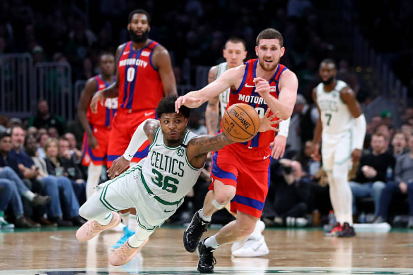 Маркус Смарт и Святослав Михайлюк / Getty Images