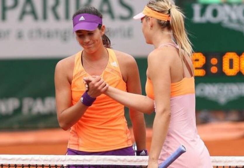 Шарапова сыграет с Мугурусой на грунтово-травяном корте