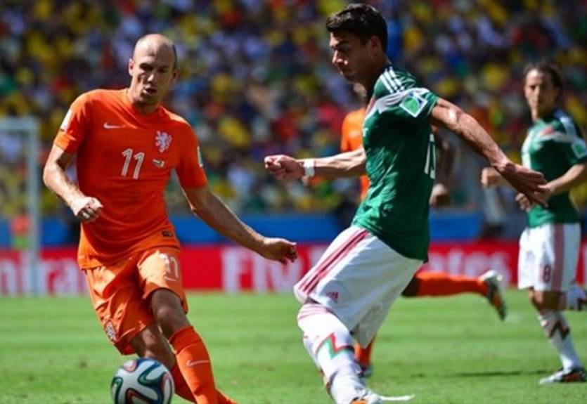 Нидерланды драматично проходят Мексику