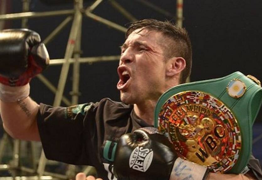 Мартинес защитил титул в непростом поединке с Мюрреем