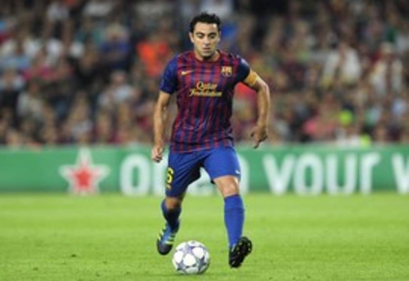 Хави: "Фабрегас помогает мне прогрессировать"