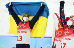 Флаг Украины, медаль и крутые прыжки: лучшие кадры с выступления Абраменко