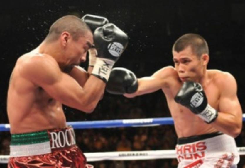 Крис Джон отложит защиту титула