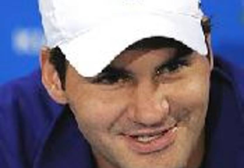 Федерер помогает детям