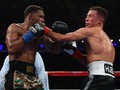 Головкин в тяжелом поединке победил Джейкобса