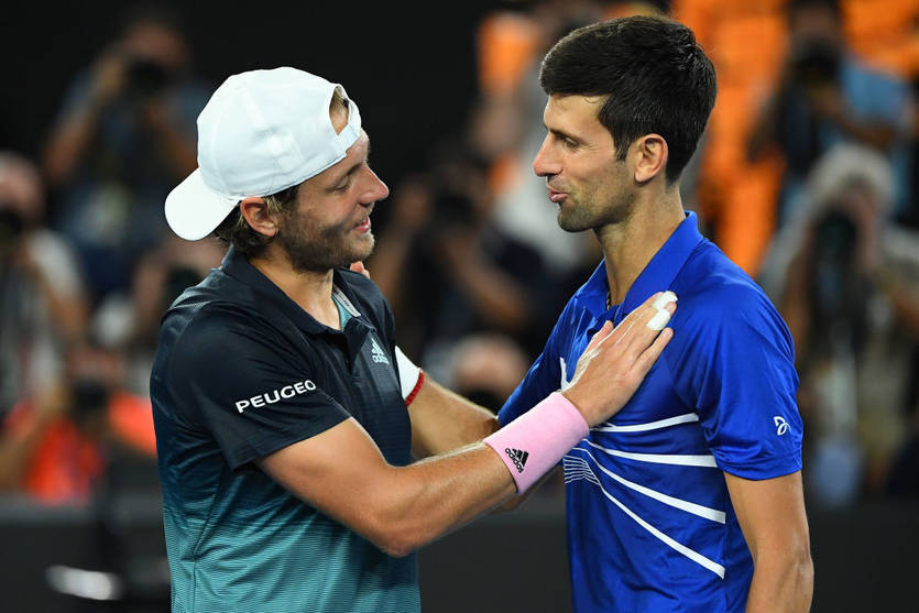 Люк Пуиль и Новак Джокович / Getty Images