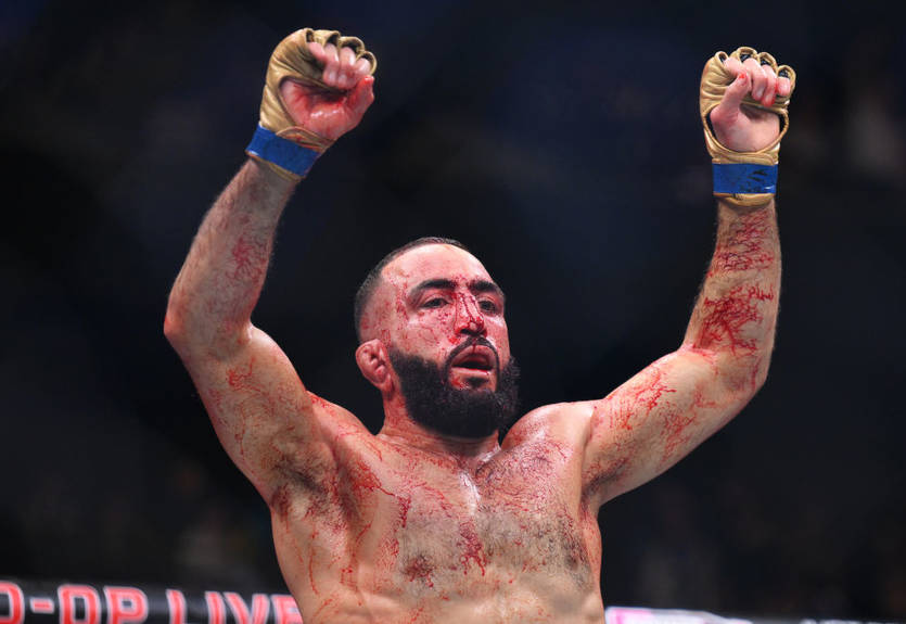 Мухаммад стал новым чемпионом UFC в полусреднем весе, победив решением судей Эдвардса